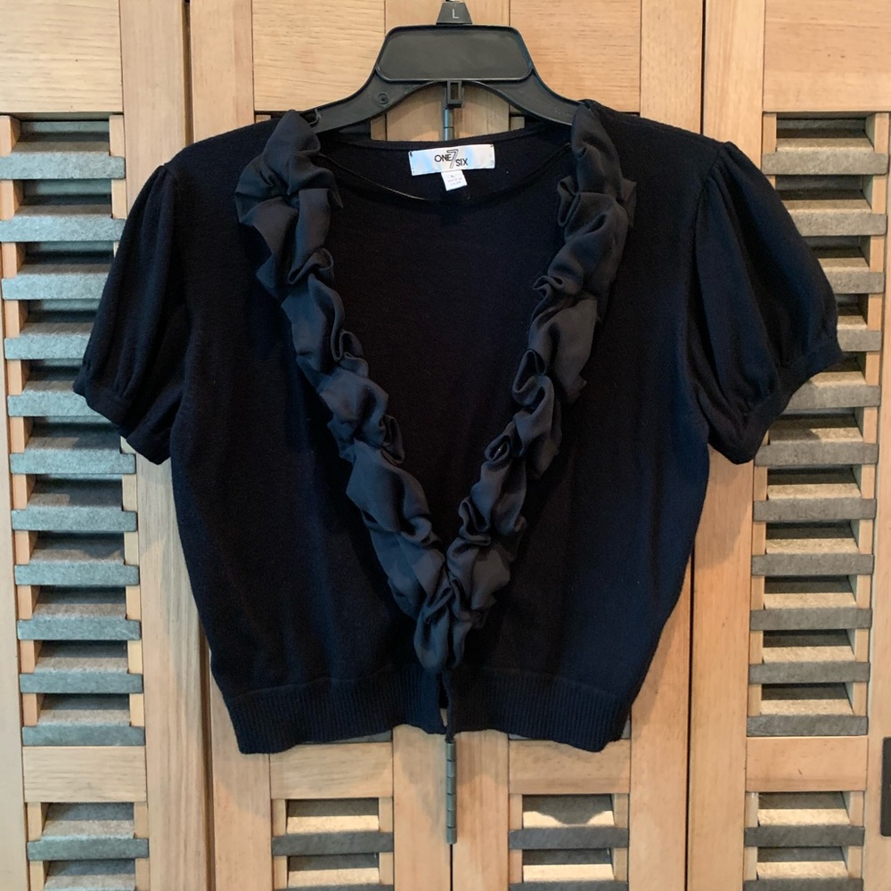 Black cap sleeve sweater with ruffles